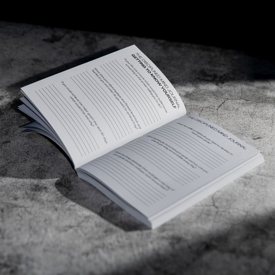 Open pages of The Disciplined Mind Journal